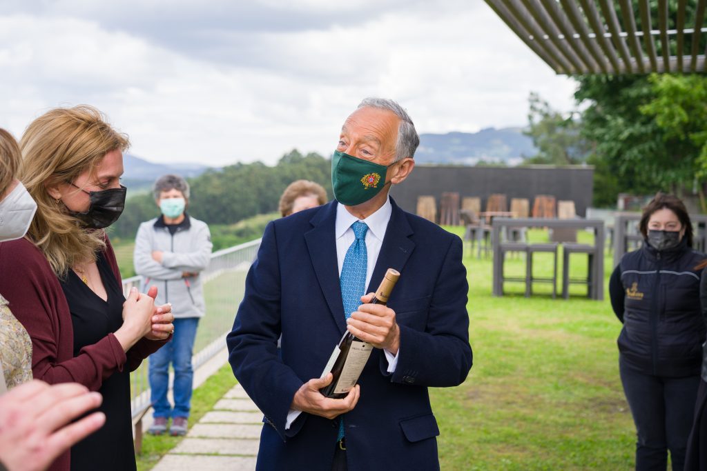 1 the President of the Republic of Portugal, Marcelo Rebelo de Sousa, holding a bottle of Soalheiro Alvarinho